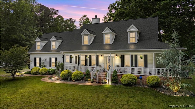 6304 Belroi Rd, Abingdon, VA 23061 - cape cod home with a porch, a chimney, and a lawn