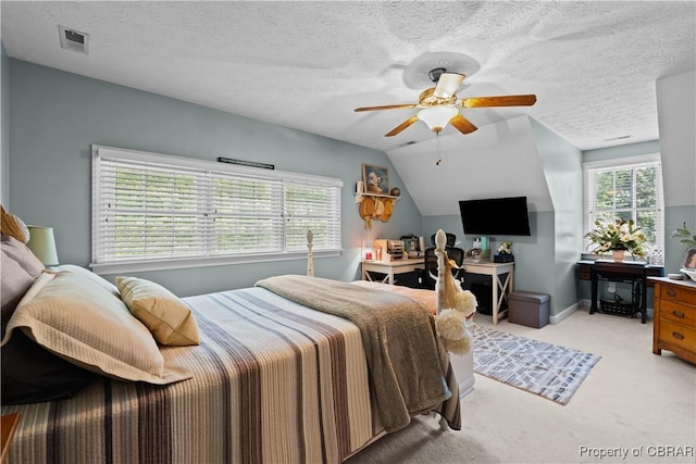 6304 Belroi Rd, Abingdon, VA 23061 - bedroom with light colored carpet, a ceiling fan, vaulted ceiling, baseboards, and a textured ceiling