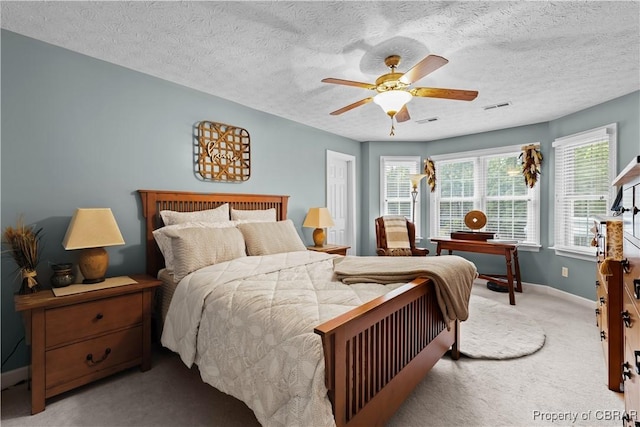 6304 Belroi Rd, Abingdon, VA 23061 - carpeted bedroom featuring baseboards, a textured ceiling, and ceiling fan