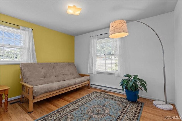 2721 Fawnwick Dr, Henrico, VA 23231 - living area featuring a baseboard radiator, healthy amount of natural light, wood finished floors, and baseboards