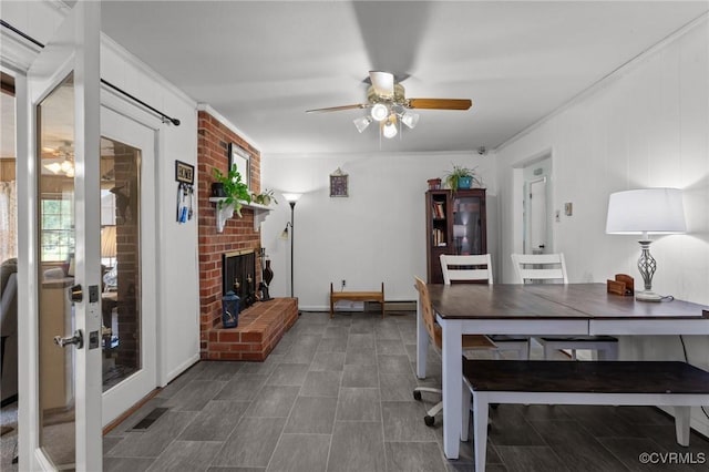 2721 Fawnwick Dr, Henrico, VA 23231 - dining space featuring crown molding, ceiling fan, and a brick fireplace