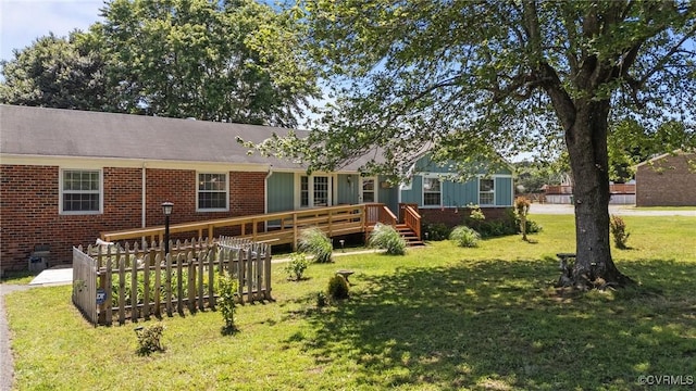 2721 Fawnwick Dr, Henrico, VA 23231 - back of house with a wooden deck, a lawn, brick siding, and board and batten siding