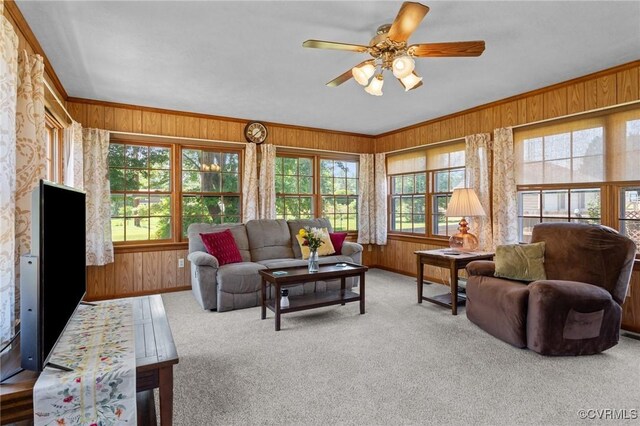 2721 Fawnwick Dr, Henrico, VA 23231 - living area with wooden walls, carpet, a ceiling fan, baseboards, and crown molding