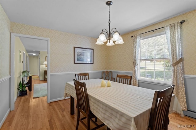 2721 Fawnwick Dr, Henrico, VA 23231 - dining room featuring a wainscoted wall, wallpapered walls, a chandelier, and light wood-style flooring
