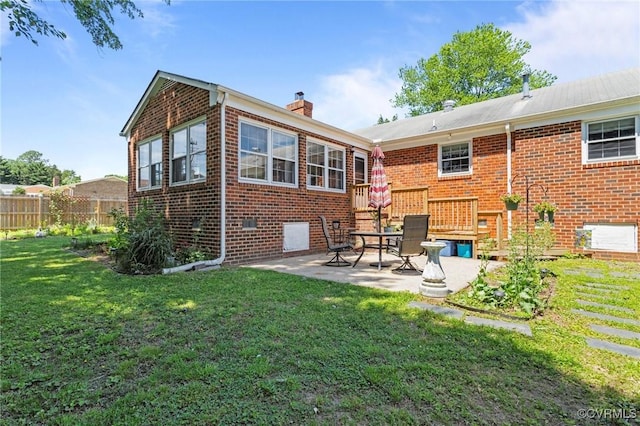 2721 Fawnwick Dr, Henrico, VA 23231 - back of house featuring brick siding, a patio area, and a chimney