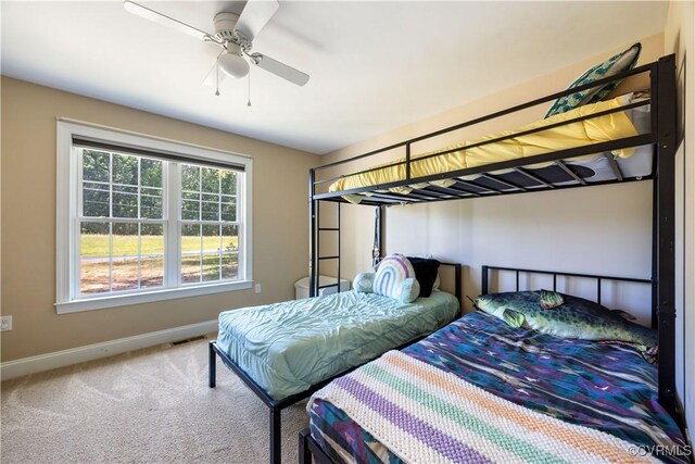 124 Vogel Rd, Cumberland, VA 23040 - carpeted bedroom with baseboards and a ceiling fan