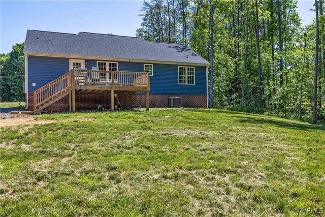 124 Vogel Rd, Cumberland, VA 23040 - rear view of house featuring a deck, central AC unit, stairs, and a lawn