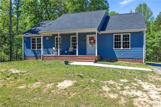 124 Vogel Rd, Cumberland, VA 23040 - view of front of house with covered porch, a front lawn, and roof with shingles