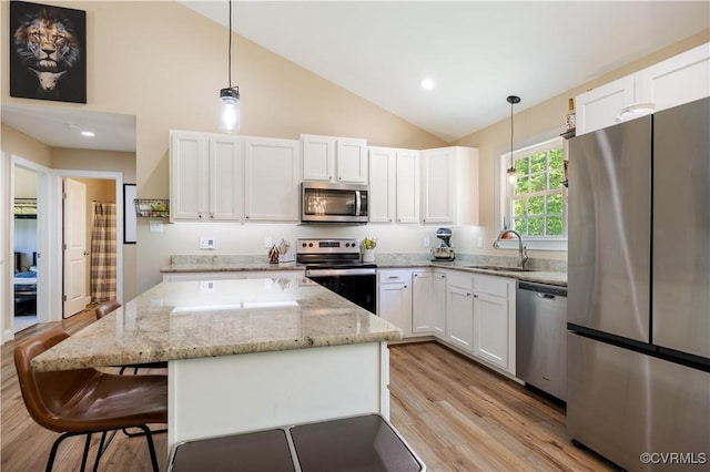 124 Vogel Rd, Cumberland, VA 23040 - kitchen featuring appliances with stainless steel finishes, a sink, white cabinets, high vaulted ceiling, and recessed lighting