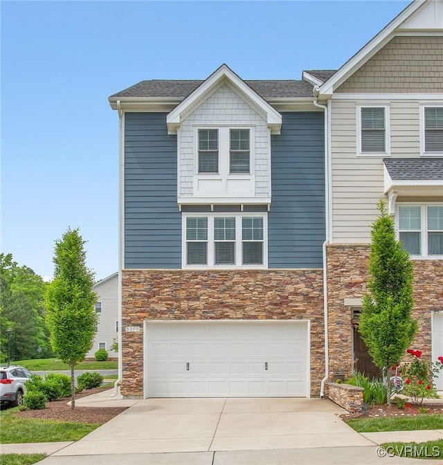 5200 Gower Pl, Glen Allen, VA 23059 - view of front of property featuring stone siding, driveway, and an attached garage