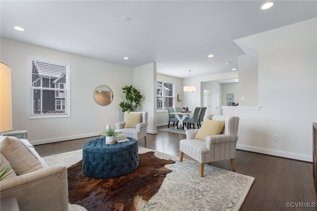 5200 Gower Pl, Glen Allen, VA 23059 - living area featuring dark wood-style flooring, recessed lighting, baseboards, and arched walkways