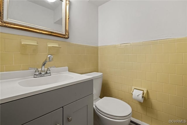 7708 Stonetree Dr, North Chesterfield, VA 23235 - half bath featuring tile walls, toilet, and vanity