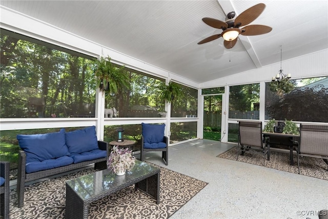 sunroom / solarium with an outdoor hangout area, ceiling fan, and vaulted ceiling