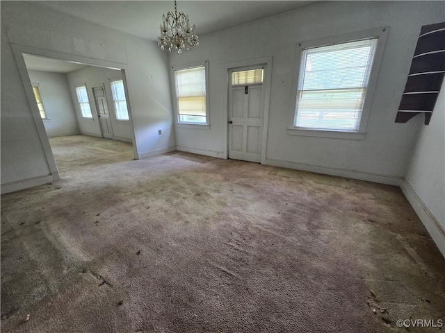 19614 Manson Church Rd, Mc Kenney, VA 23872 - carpeted entryway featuring a chandelier and baseboards