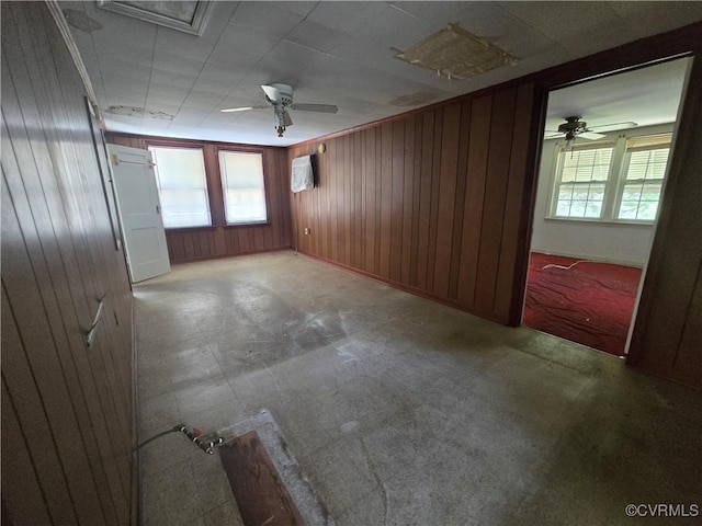 19614 Manson Church Rd, Mc Kenney, VA 23872 - unfurnished room with a ceiling fan, plenty of natural light, and wood walls