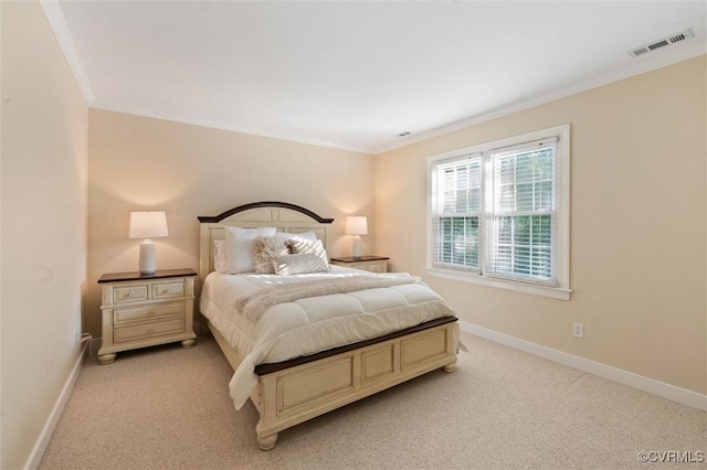 bedroom featuring ornamental molding, light carpet, and baseboards