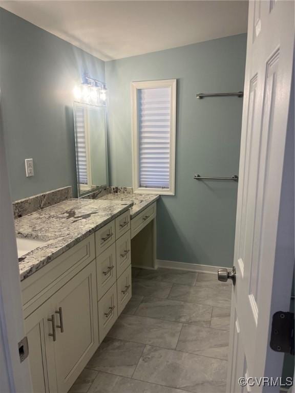 2720 Brunswick Rd, Emporia, VA 23847 - full bathroom with double vanity, baseboards, and marble finish flooring