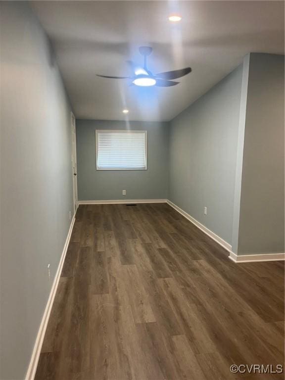 2720 Brunswick Rd, Emporia, VA 23847 - empty room featuring ceiling fan, dark wood-type flooring, and baseboards
