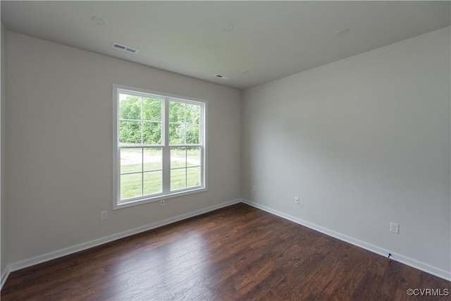 5142 Stavely Rd, Chester, VA 23831 - unfurnished room with plenty of natural light, baseboards, and dark wood-style flooring