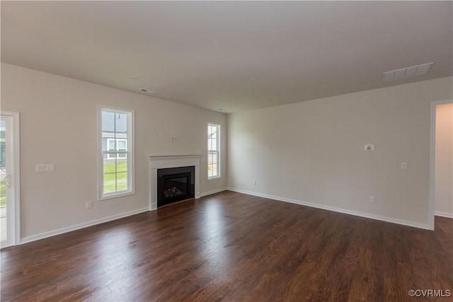 5142 Stavely Rd, Chester, VA 23831 - unfurnished living room featuring dark wood-type flooring, baseboards, and a fireplace