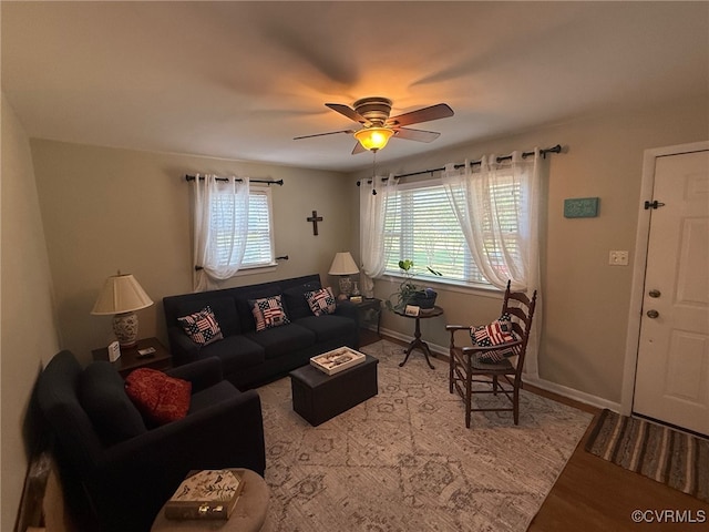 13107 Five Forks Rd, Amelia Courthouse, VA 23002 - living room with a ceiling fan, baseboards, and light wood-type flooring
