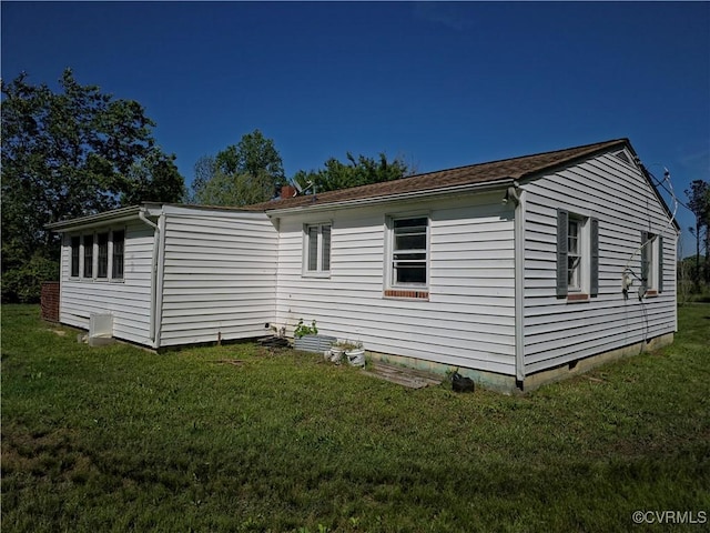 2446 Mantua Rd, Stevensville, VA 23161 - view of property exterior with a yard