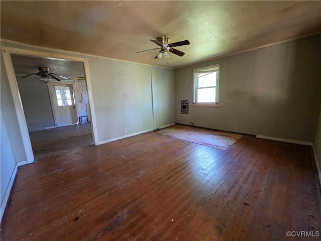 2446 Mantua Rd, Stevensville, VA 23161 - spare room with ornamental molding, a ceiling fan, wood-type flooring, healthy amount of natural light, and baseboards