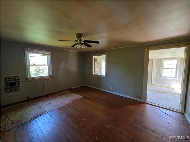 2446 Mantua Rd, Stevensville, VA 23161 - unfurnished room featuring hardwood / wood-style floors, ceiling fan, baseboards, and ornamental molding