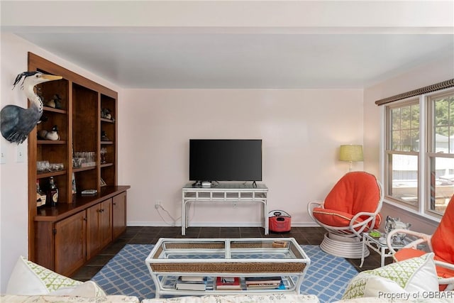 20 Winstead Dr, Irvington, VA 22480 - living area featuring dark tile patterned flooring and baseboards