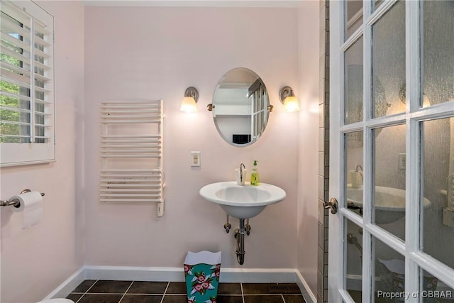 20 Winstead Dr, Irvington, VA 22480 - bathroom featuring radiator, tile patterned floors, baseboards, and a towel warmer