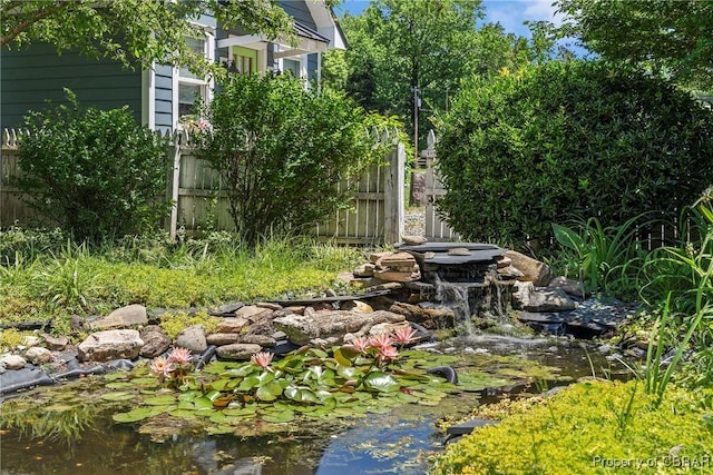 20 Winstead Dr, Irvington, VA 22480 - view of yard with a small pond