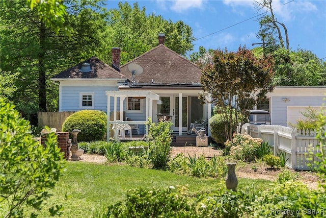20 Winstead Dr, Irvington, VA 22480 - back of property featuring a chimney