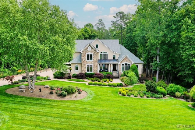 717 Old Stream Rd, Manakin Sabot, VA 23103 - view of front of property with stone siding and a front lawn