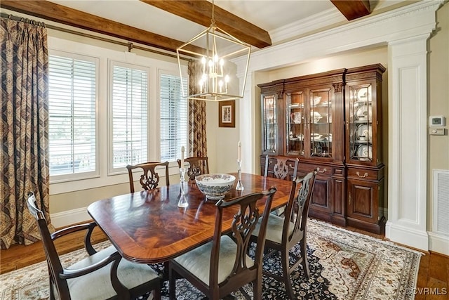 717 Old Stream Rd, Manakin Sabot, VA 23103 - dining area with beamed ceiling, light wood-type flooring, a chandelier, decorative columns, and baseboards