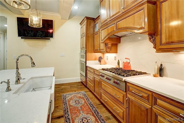 717 Old Stream Rd, Manakin Sabot, VA 23103 - kitchen with appliances with stainless steel finishes, a sink, wood finished floors, light countertops, and beamed ceiling