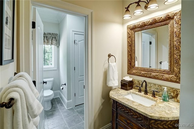 717 Old Stream Rd, Manakin Sabot, VA 23103 - bathroom featuring vanity, toilet, baseboards, and ornamental molding