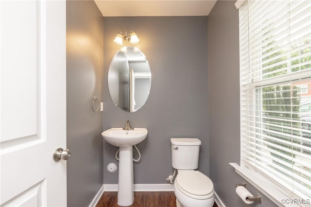 3316 New Heritage Loop, Henrico, VA 23231 - half bathroom featuring baseboards, wood finished floors, toilet, and a sink