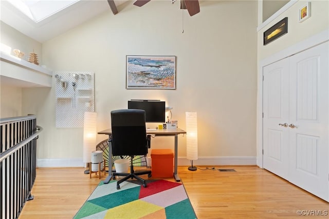 9 E Clay St Unit U2, Richmond, VA 23219 - home office featuring wood finished floors, baseboards, a ceiling fan, high vaulted ceiling, and beam ceiling