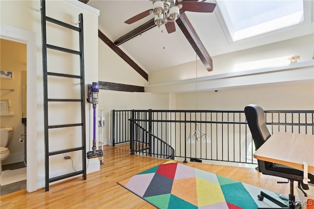 9 E Clay St Unit U2, Richmond, VA 23219 - workout area with a ceiling fan, a skylight, wood finished floors, and high vaulted ceiling