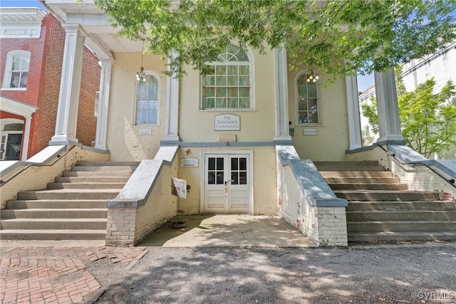 9 E Clay St Unit U2, Richmond, VA 23219 - doorway to property featuring french doors and stucco siding