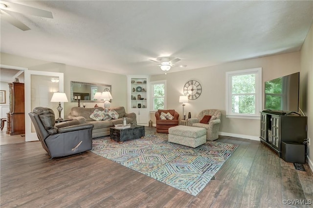 1825 Rock Point Dr, Powhatan, VA 23139 - living room with a ceiling fan, wood finished floors, built in shelves, and baseboards