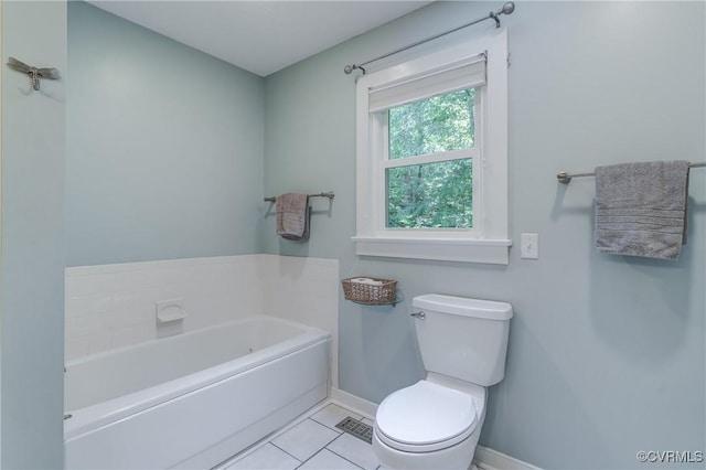 1825 Rock Point Dr, Powhatan, VA 23139 - bathroom featuring toilet, a garden tub, baseboards, and tile patterned flooring