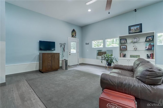 1825 Rock Point Dr, Powhatan, VA 23139 - living room with wood finished floors, baseboards, plenty of natural light, and recessed lighting