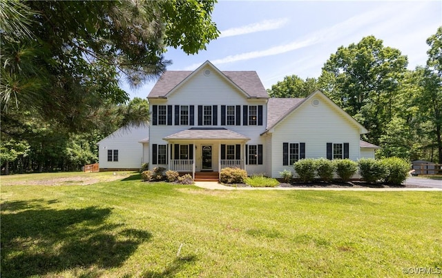 8401 Bethia Rd, Chesterfield, VA 23832 - view of front of house featuring a front yard, a porch, and a shingled roof