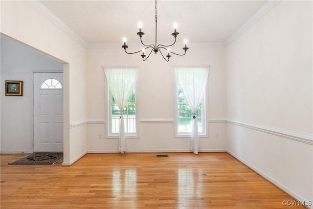 8401 Bethia Rd, Chesterfield, VA 23832 - unfurnished dining area with a chandelier, wood finished floors, ornamental molding, and baseboards