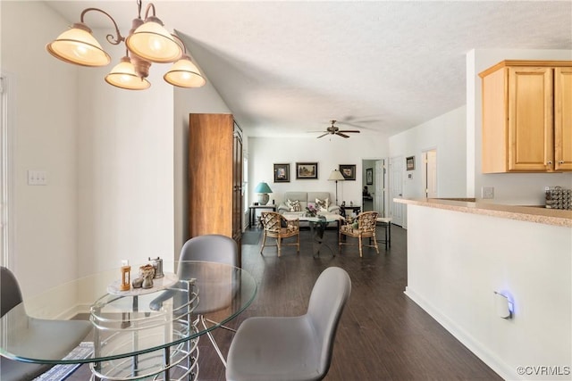 8401 Bethia Rd, Chesterfield, VA 23832 - dining space with dark wood-style floors, ceiling fan, and a textured ceiling