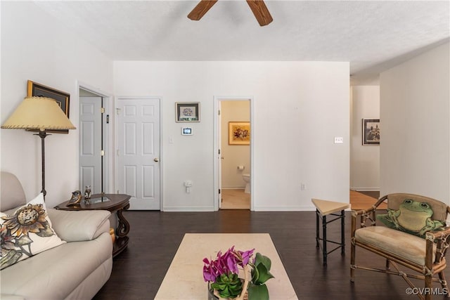 8401 Bethia Rd, Chesterfield, VA 23832 - living area featuring a ceiling fan, wood finished floors, and baseboards