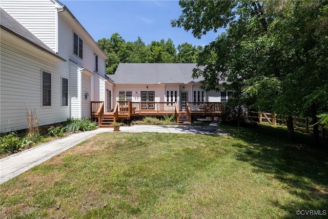 8401 Bethia Rd, Chesterfield, VA 23832 - back of property with a deck, a lawn, and a patio