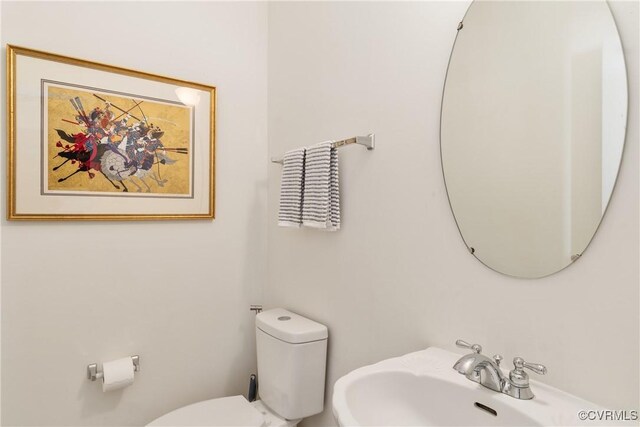 8401 Bethia Rd, Chesterfield, VA 23832 - bathroom featuring a sink and toilet