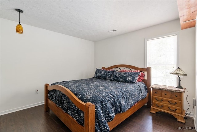 8401 Bethia Rd, Chesterfield, VA 23832 - bedroom featuring wood finished floors, baseboards, and a textured ceiling